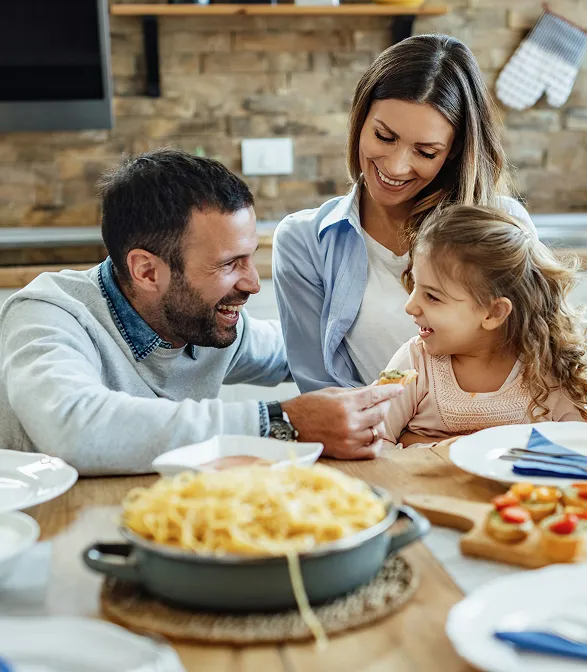 family with food in the table